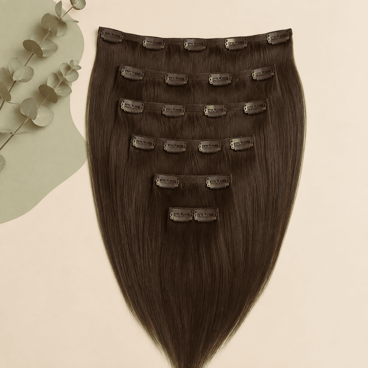 Natural dark-brown clip-in human hair extension set with sewn snap clips
