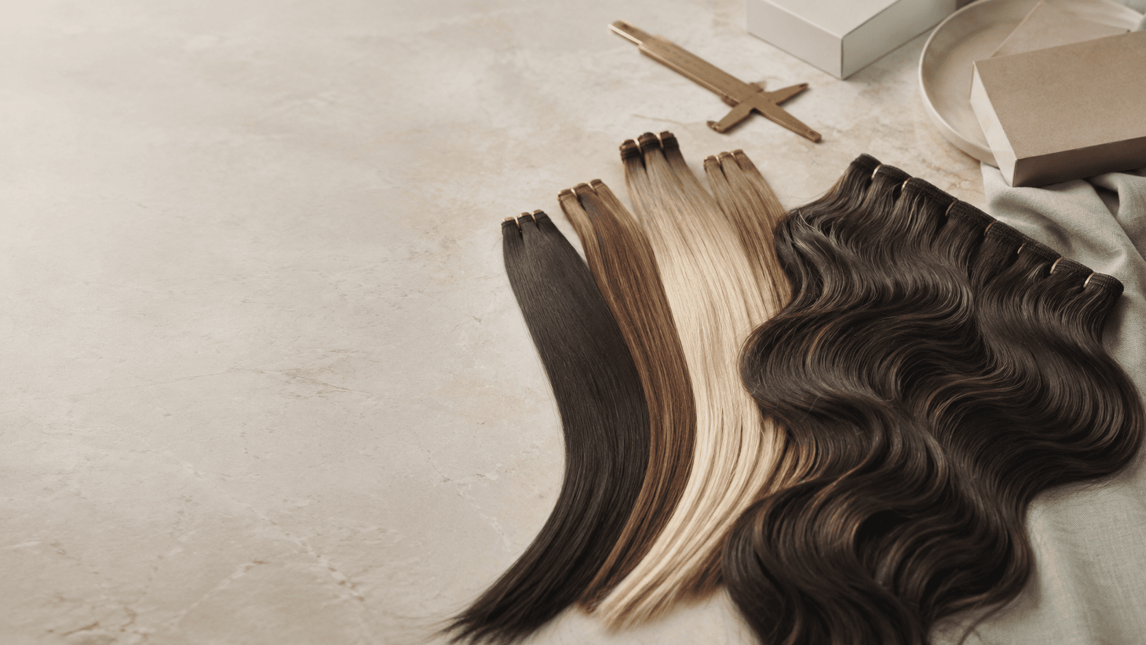 Human hair extension swatches and wefts arranged for professional sourcing